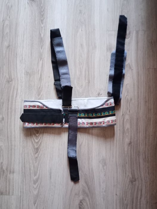 Temblak, pas stabilizujący na ramię
