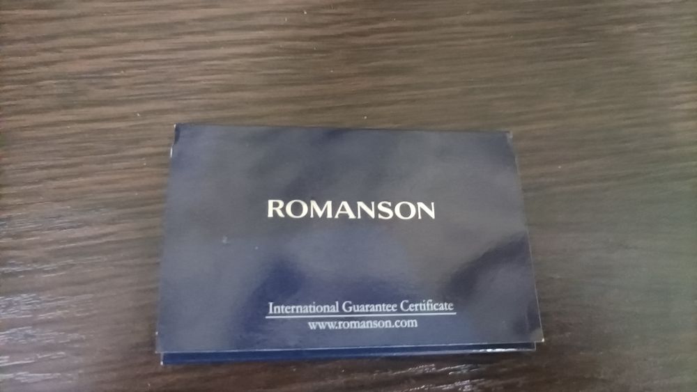 Годинник,Romanson