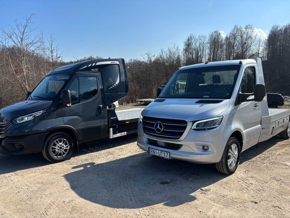 Transport aut maszyn holowanie pomoc drogowa autolaweta laweta