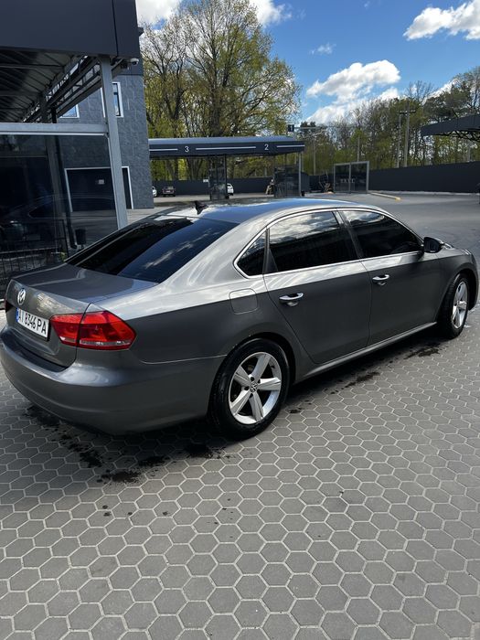 Volkswagen Passat 2012 VIN 1VWBP7A35CC042783 фото оголошення 2 з 7