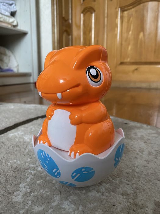 Динозаврик неваляшка