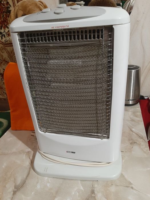 Электрообогреватель галогеновый б/у .