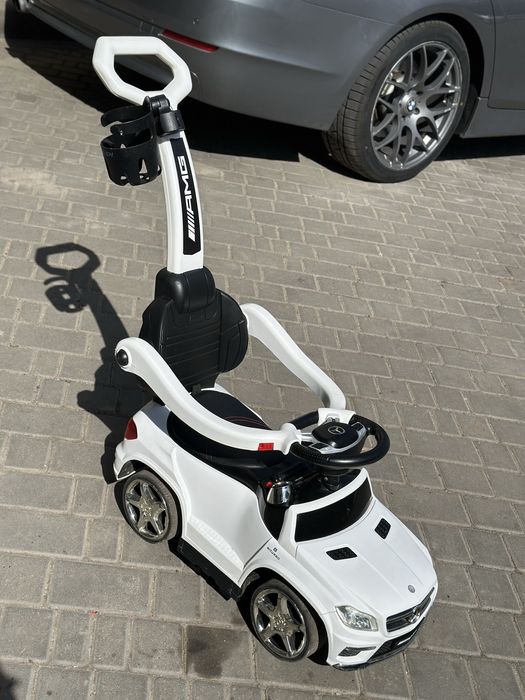 Машинка толокар з батьківською ручкою