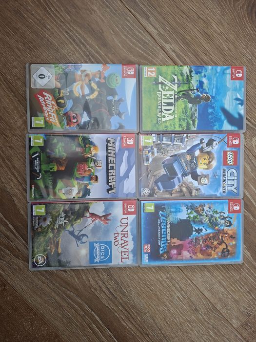 Nintendo Switch + 6 gier etui ring