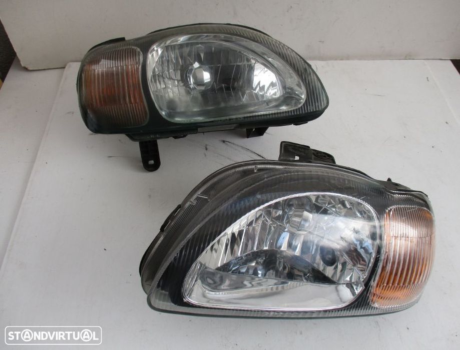 Farol Optica Suzuki Baleno esquerdo / direito