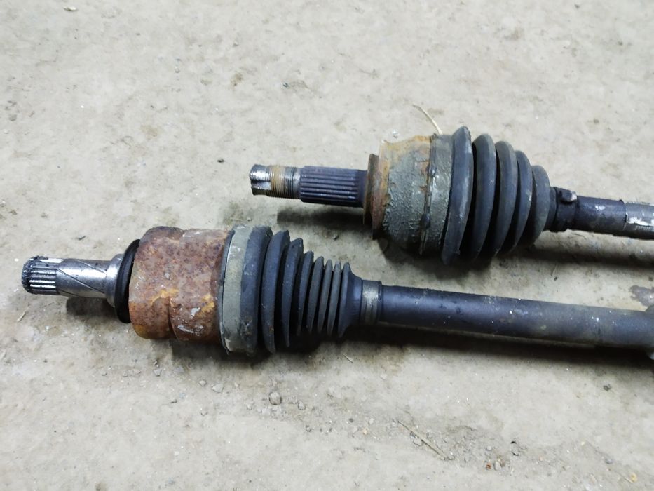 Полуось права ліва піввісь Corsa D 1.3 cdti