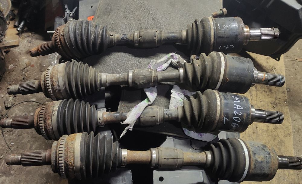 Привод,полуось піввісь Мазда СХ7,Mazda CX7 ER 2.3L3VDT,2.2 MZR-CD