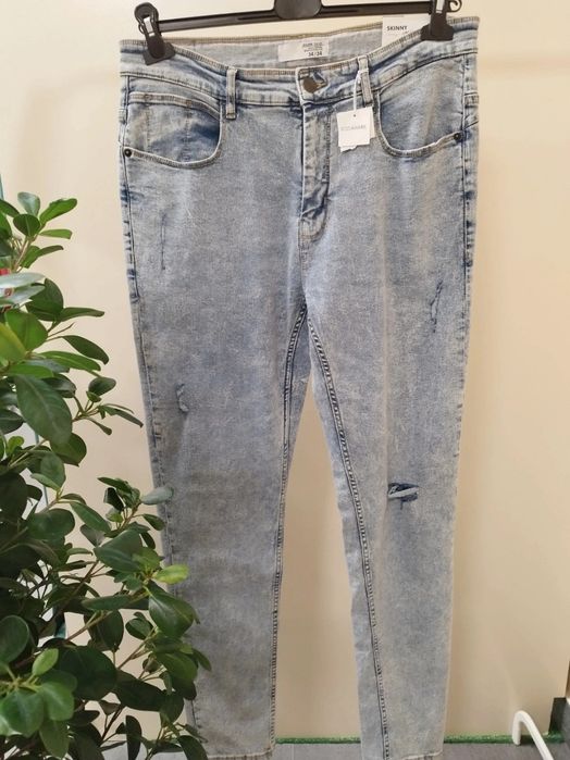NOWE spodnie jeansy męskie Cropp