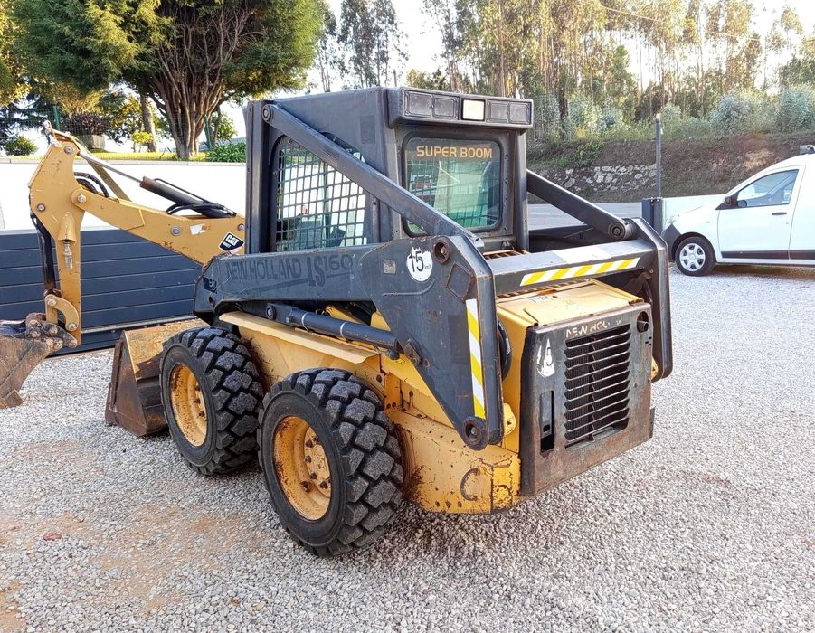 Mini Pá-Carregadora NEW HOLLAND (2004) 6700h