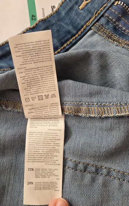 Nowe dżinsy dzwony Sinsay L/XL