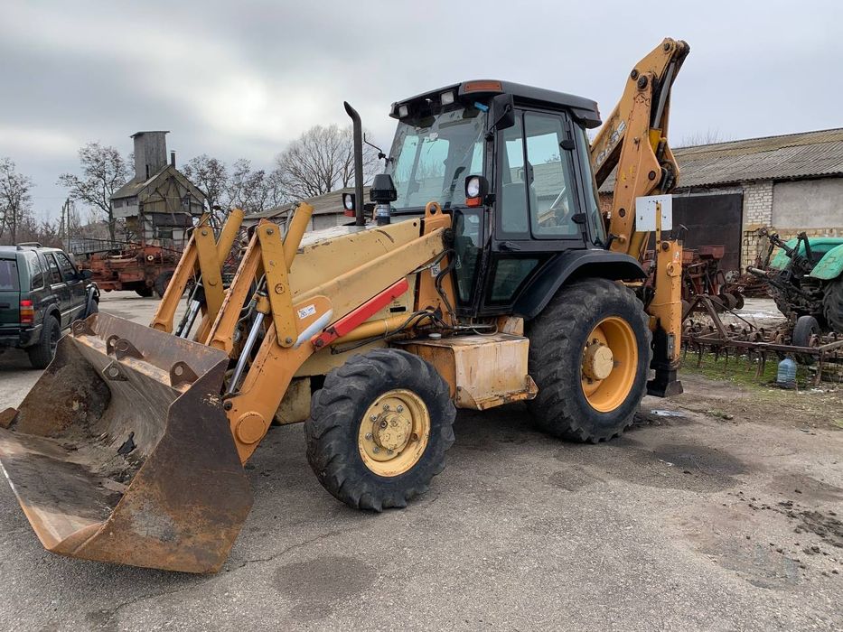 Case 580SM екскаватор навантажувач