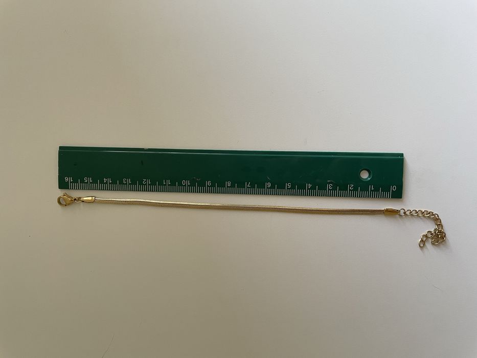 Pulseira de malha dourada