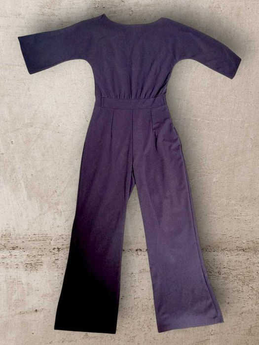 Темно-синій комбінезон, злегка еластичний, кльош