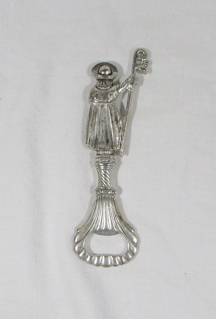 Saca-caricas ornamentado.