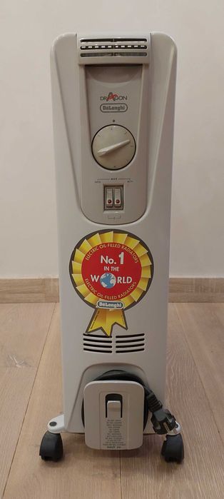 Масляный радиатор De'Longhi 1800 грн с термостатом  2000 Вт Вес 16,2кг