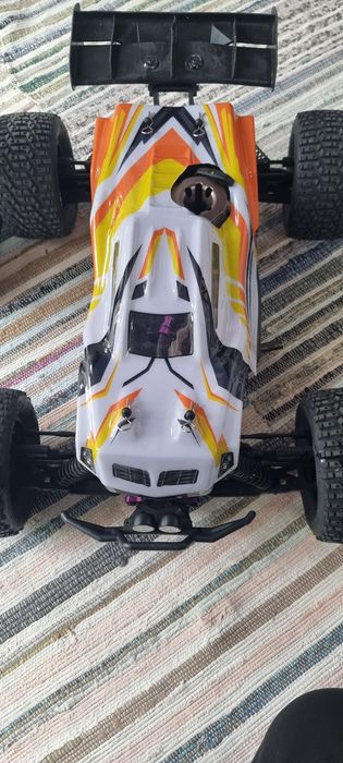 Vendo truggy 1/8 hpi hellfire  motor 4.6