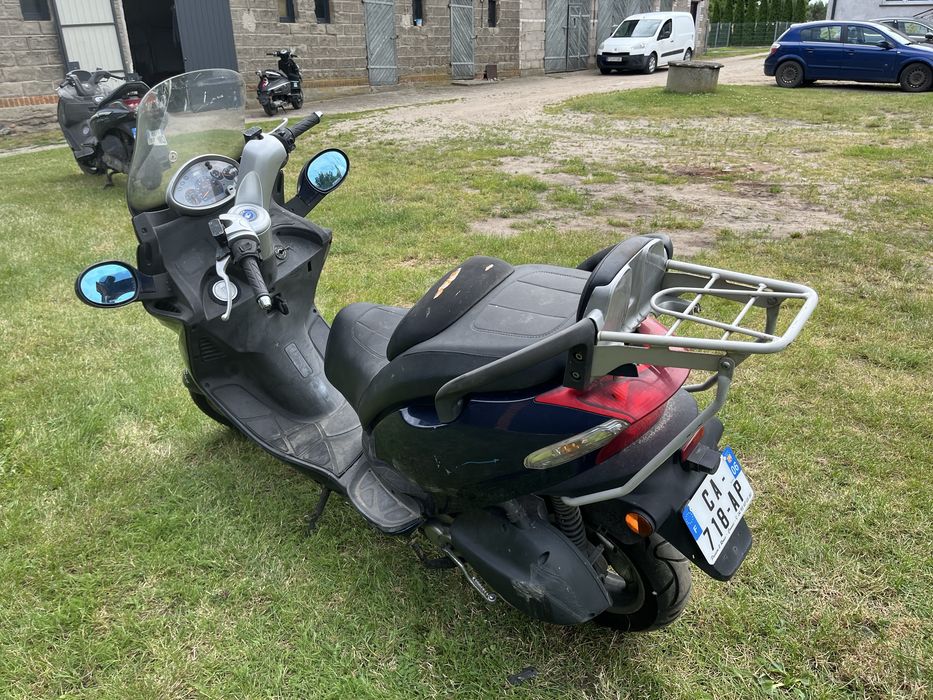 Kymco Grand Dink 125 na części czasza osłony gaźnik lusterka płozy