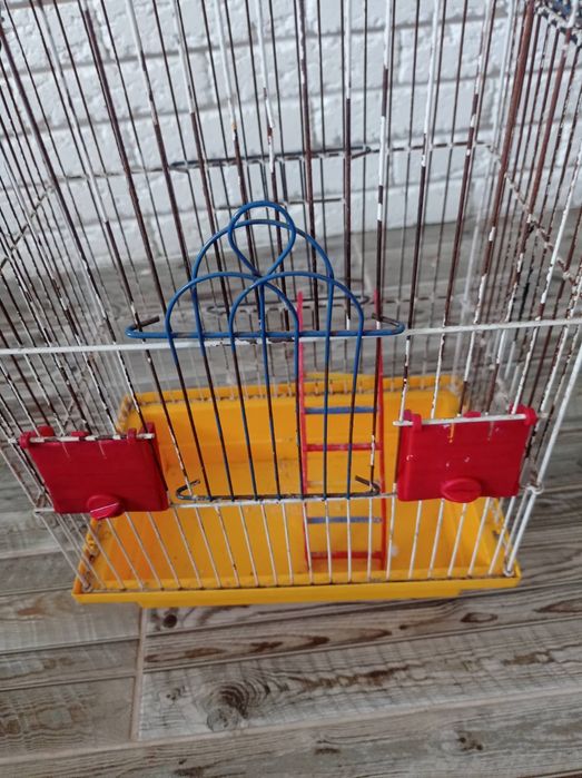 Клітка для хвилястих папуг