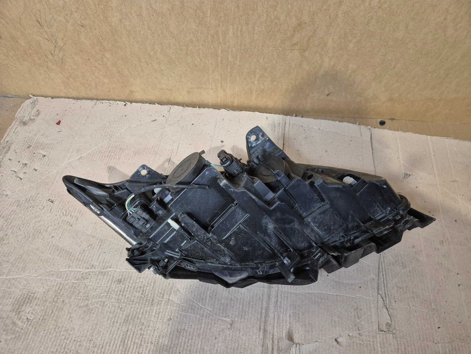 Renault Laguna III lampa przednia lewa przód.