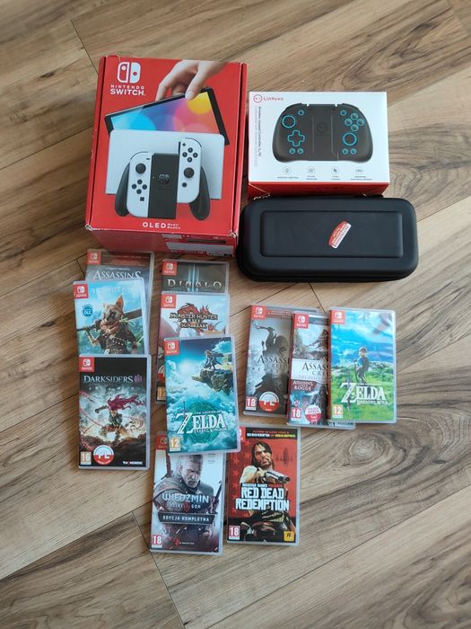 Nintendo Switch OLED 64 GB + 14 gier na kartach + akcesoria