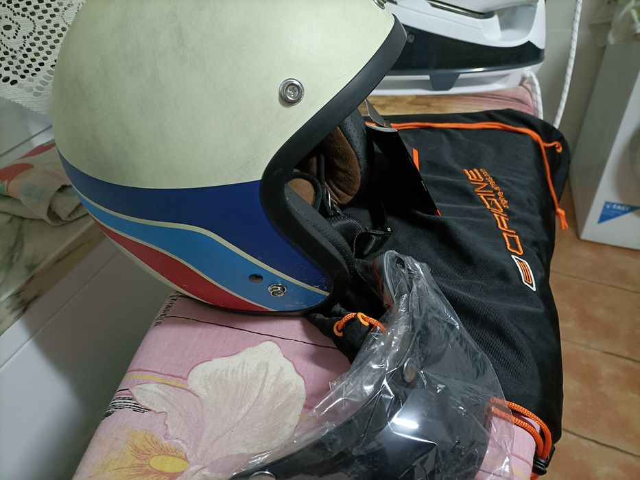 Capacete novo  E origine