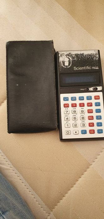 Material de musica e uma calculador clasico mais 40 anos