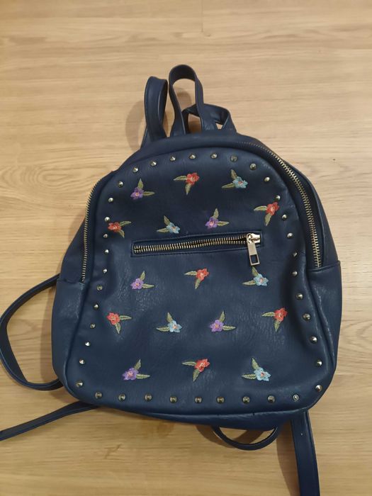 Mochila azul como NOVA