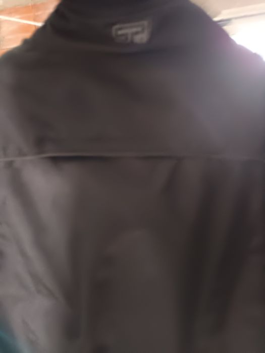 Black motorcycle jacket, size M, new, used once with back protector64750578592897123