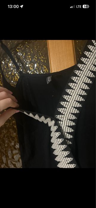 Kombinezon z regulowanymi ramiączkami