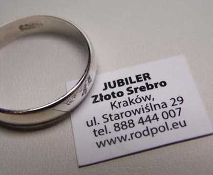 Srebrna gładka obrączka R.24 szerokość 4,8 mm.