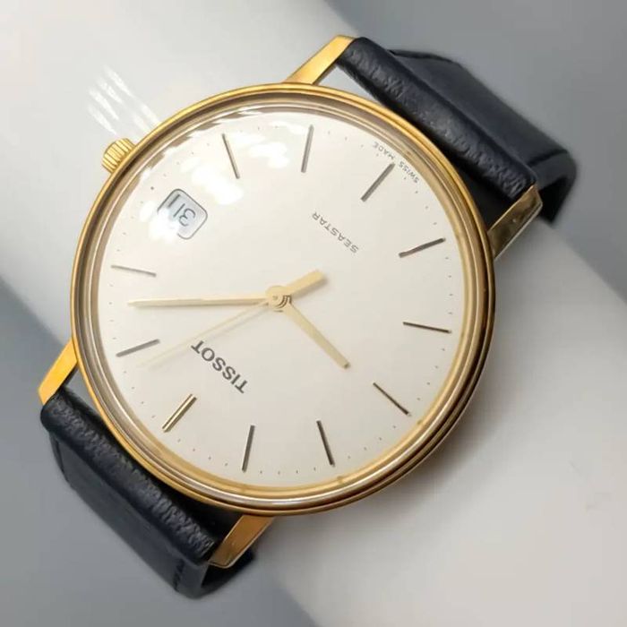 Relógio Tissot em ouro 18 quilates; 28.88 gramas; 23cm