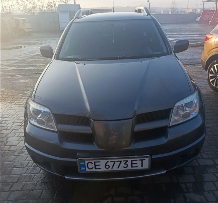 Повнопривідний кросовер Mitsubishi Outlander газ-бензин