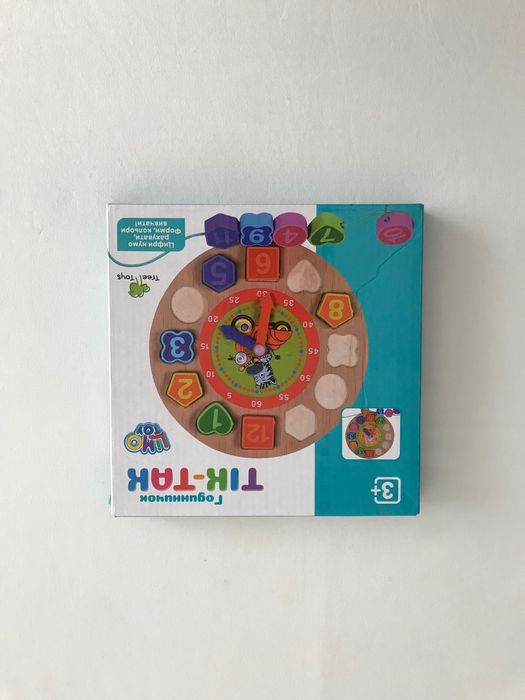 Годинничок шнурівка дерев’яні іграшки годинник