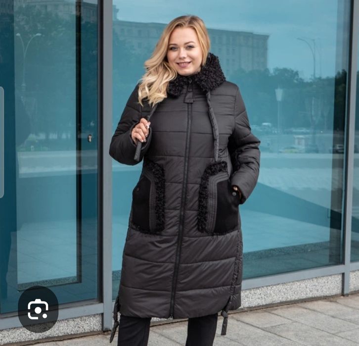 Продам пуховик большого размера.