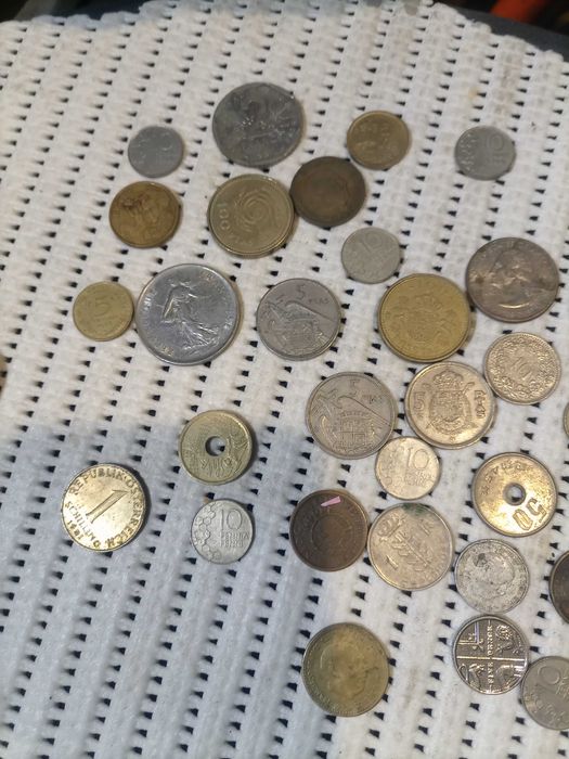 Notas e moedas de colecção