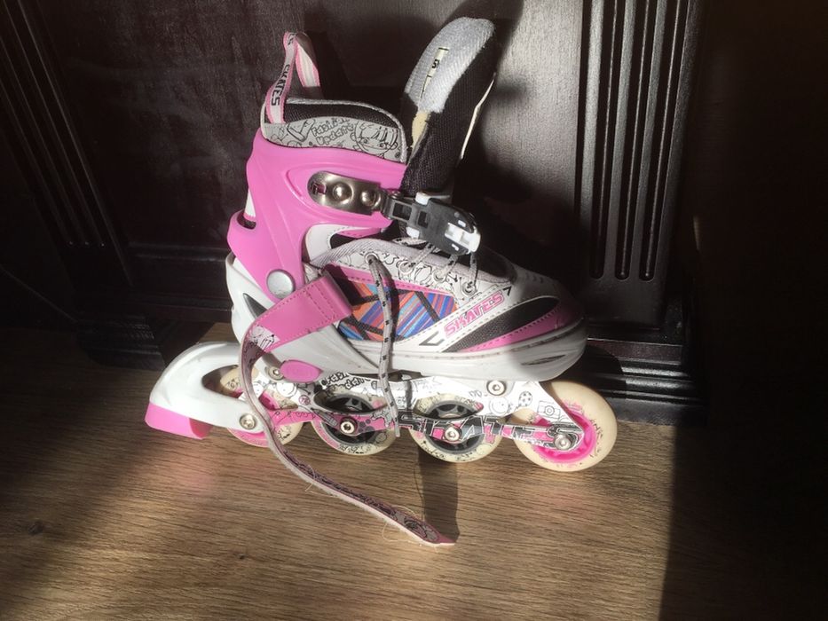 Роликовые коньки