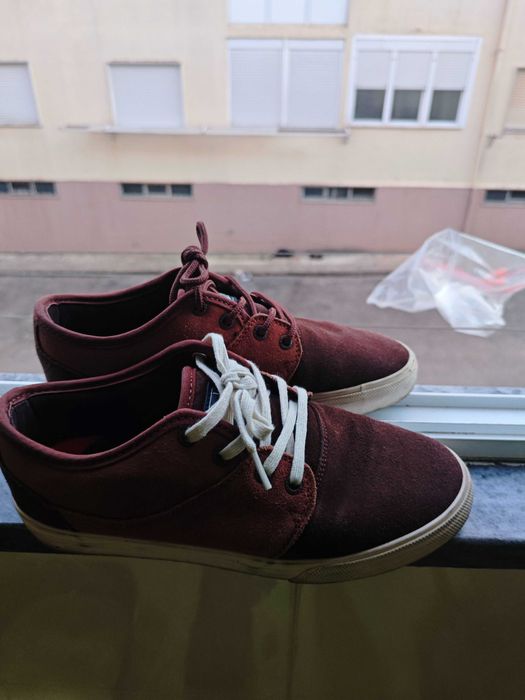 Tênis marca globe