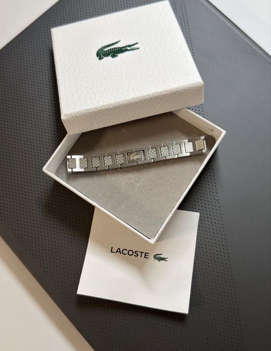 Браслет Lacoste в упаковці. Довжина 21 см.