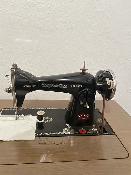 Maquina de costura vintage marca suprema