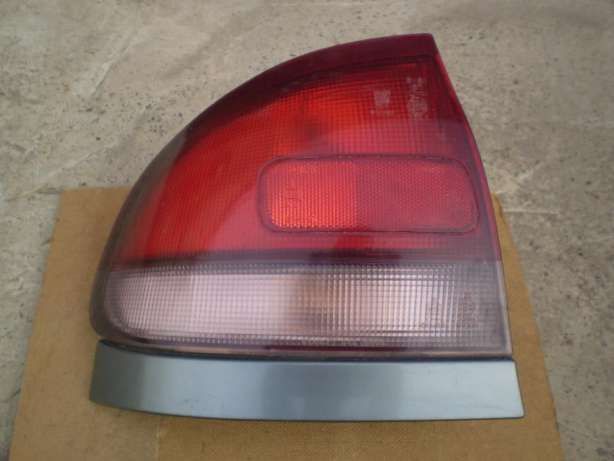 Продам задний левый фонарь на MAZDA 626 GE хетчбек