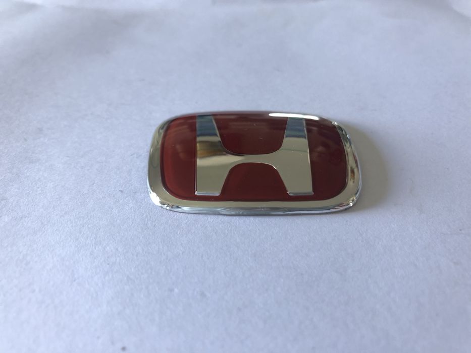 Simbolo Honda volante vermelho