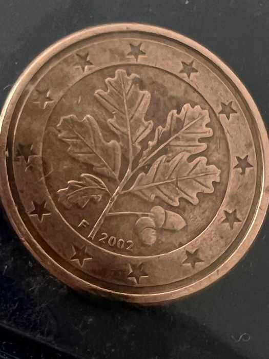 moedas u.s.a e Alemanha e da Finlândia com defeito
