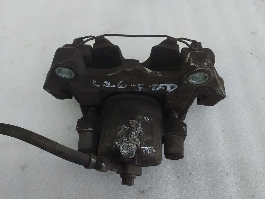 Pinça travão / maxila de travão frente direita OPEL Astra H Caravan (L