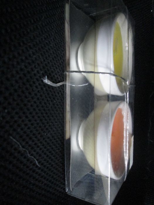 Velas perfumadas em recipiente de porcelana vidrada