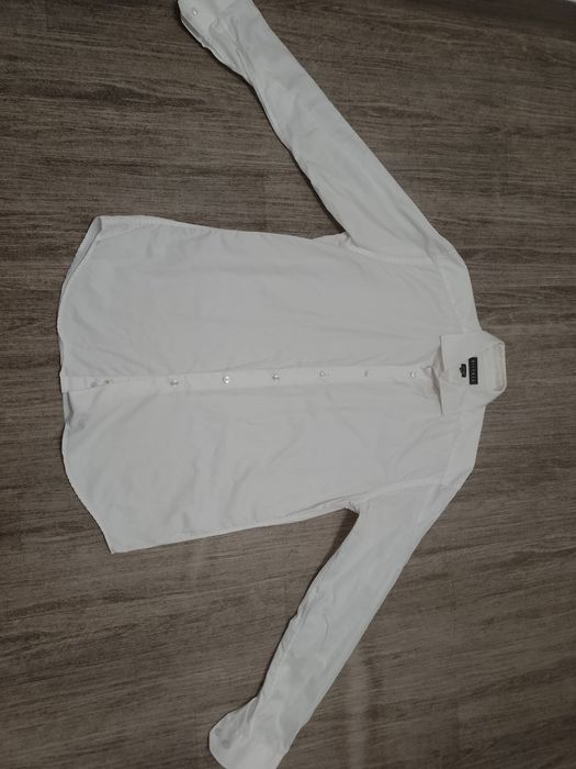 Sprzedam męską koszulę rozmiar 42 firmy Vistula.