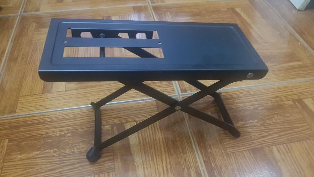 Apoio de pé para guitarrista
