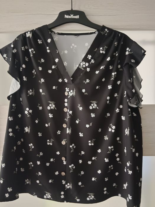 Dwie bluzki koszulowe.