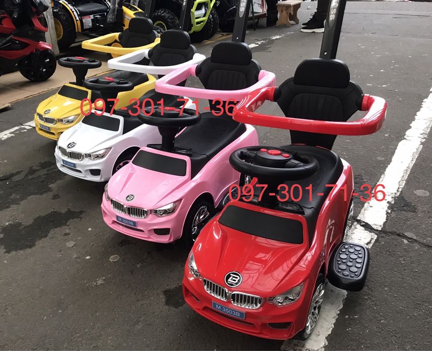 Толокар с ручкой поворотной БМВ музыка и свет, скидка!!!