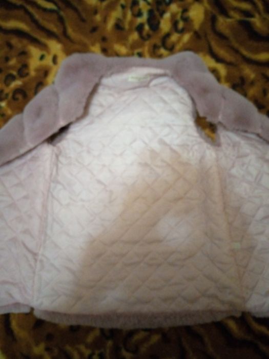 Продам меховую желетку