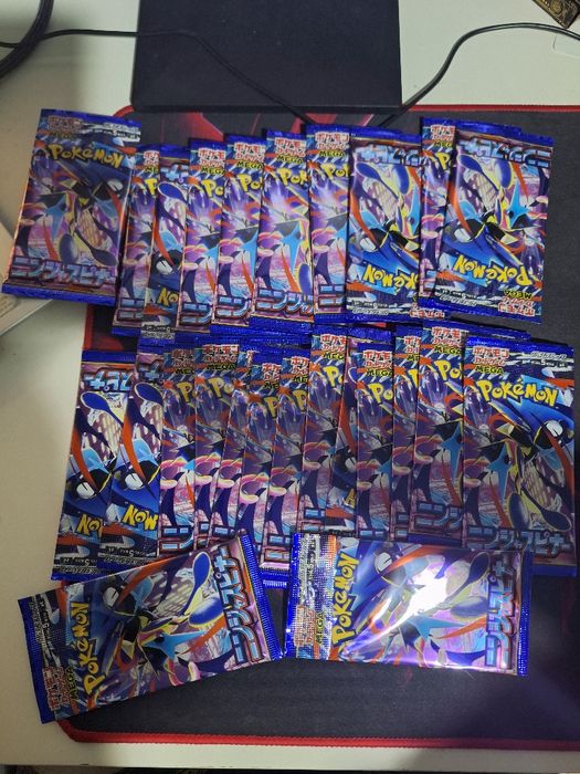 25 Pacotes Pokémon Mega Ninja Spinner Japonês